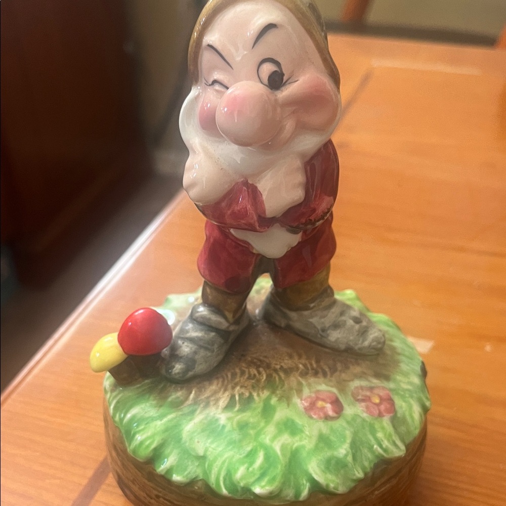 Charming Figurine with Red and Green Accents